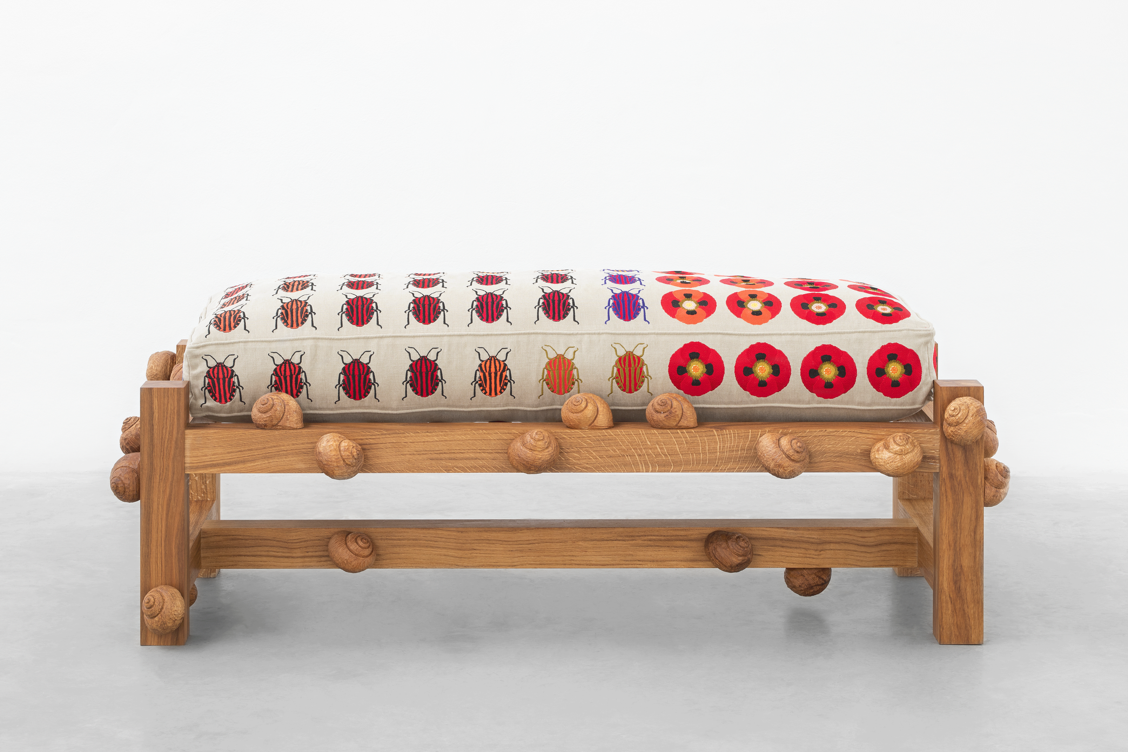 Oak bench with striped shield bugs, opium poppy flowers and snails