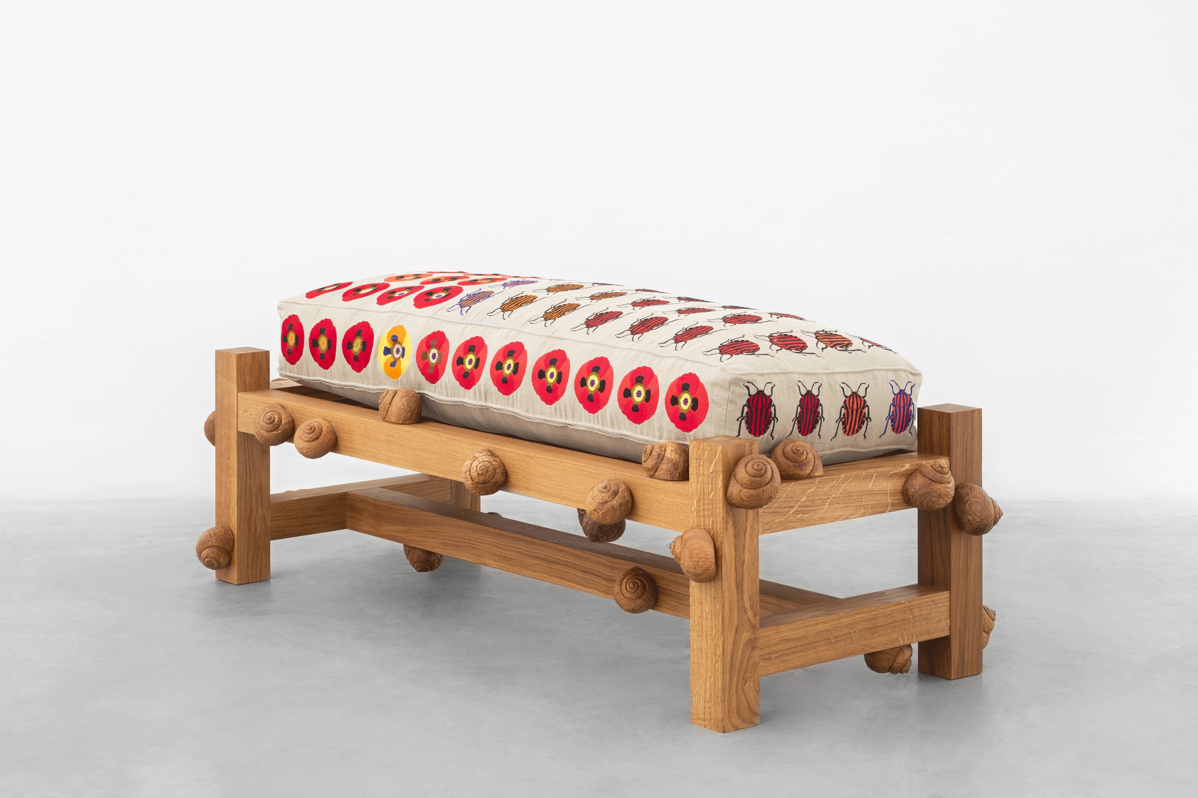 Oak bench with striped shield bugs, opium poppy flowers and snails