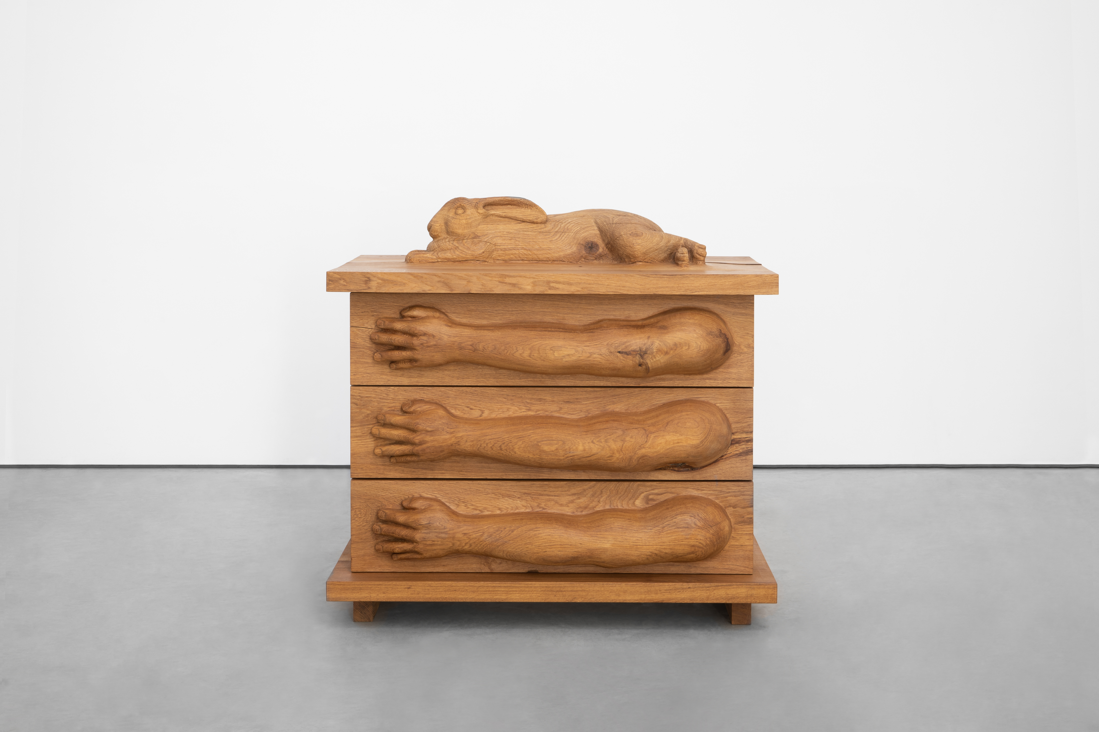 Oak chest of drawers with giant Flanders rabbit and arms