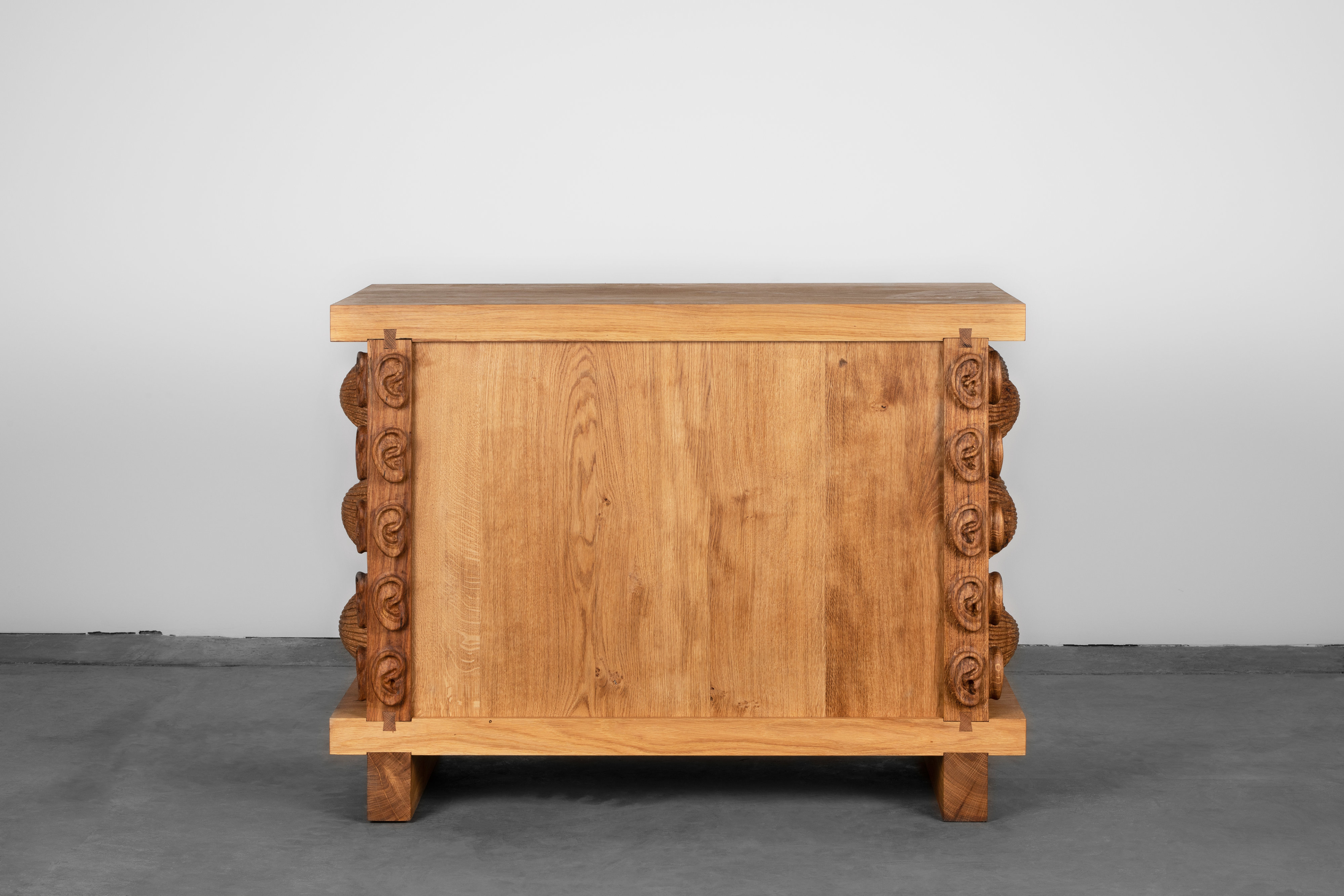 Oak cabinet with cockles and ears