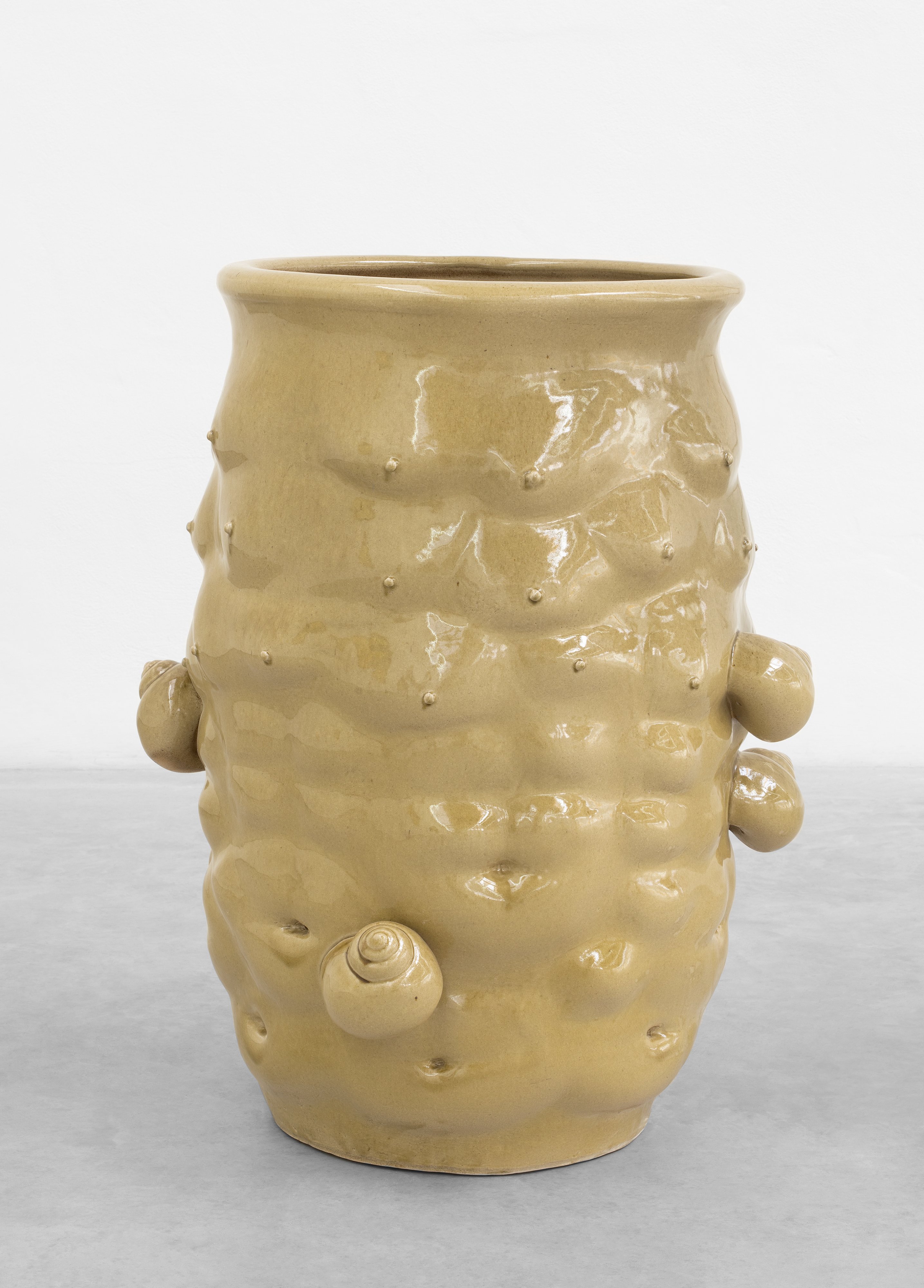 Stoneware jar with body fragments and snails