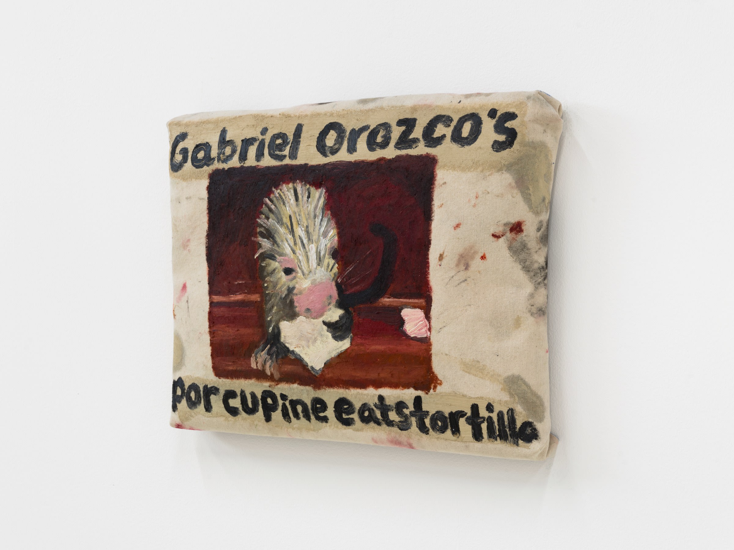 Gabriel's porcupine eating tortilla chip