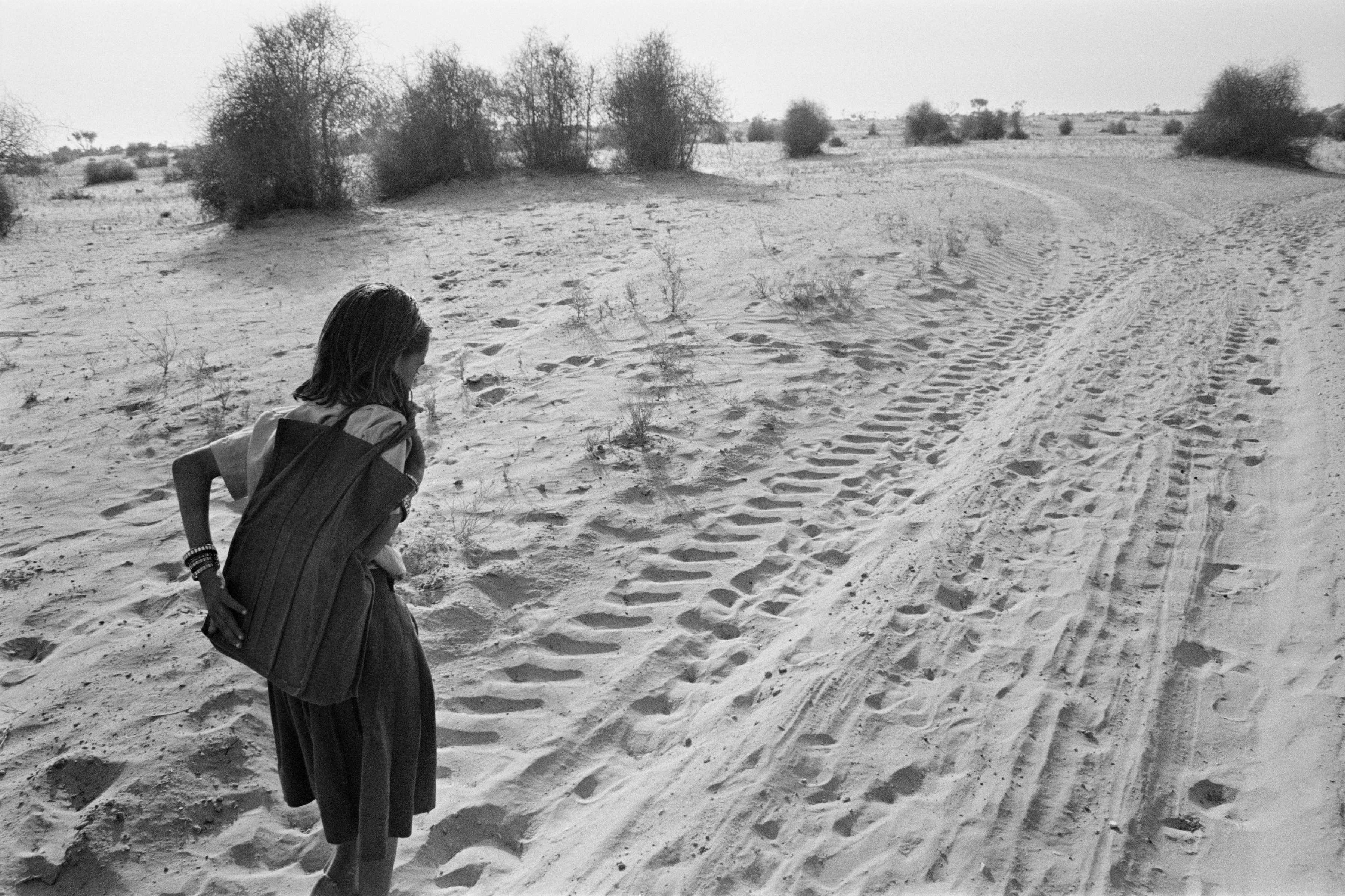 Bhalmati walking home from school, a distance of more than six kilometers