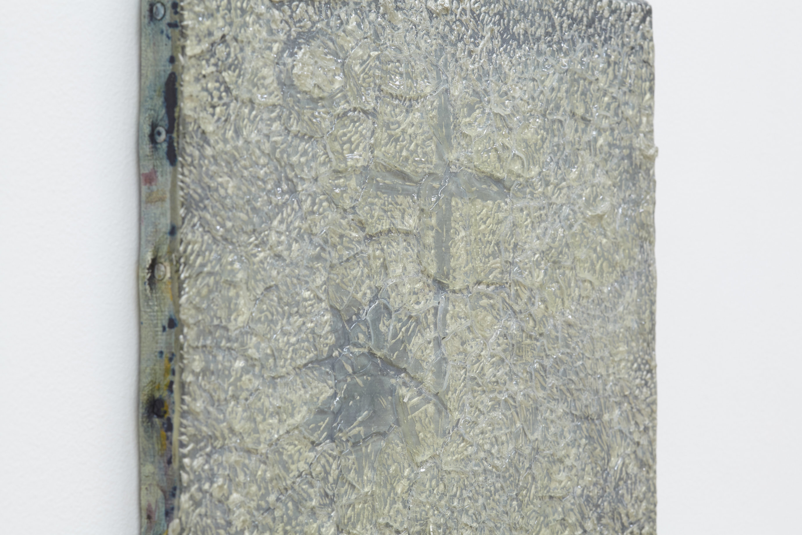 A cross confined in a painting