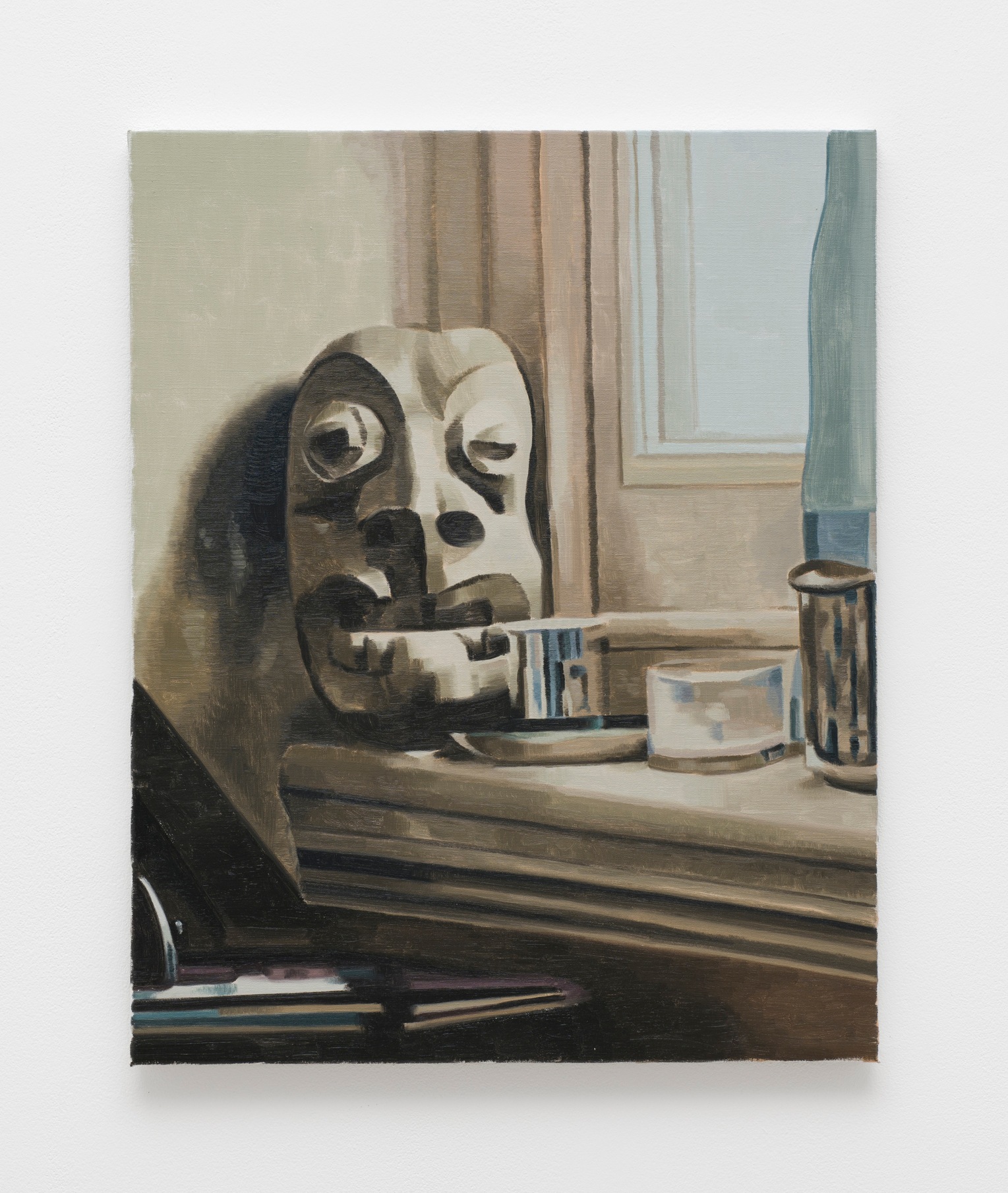 Mask on window ledge