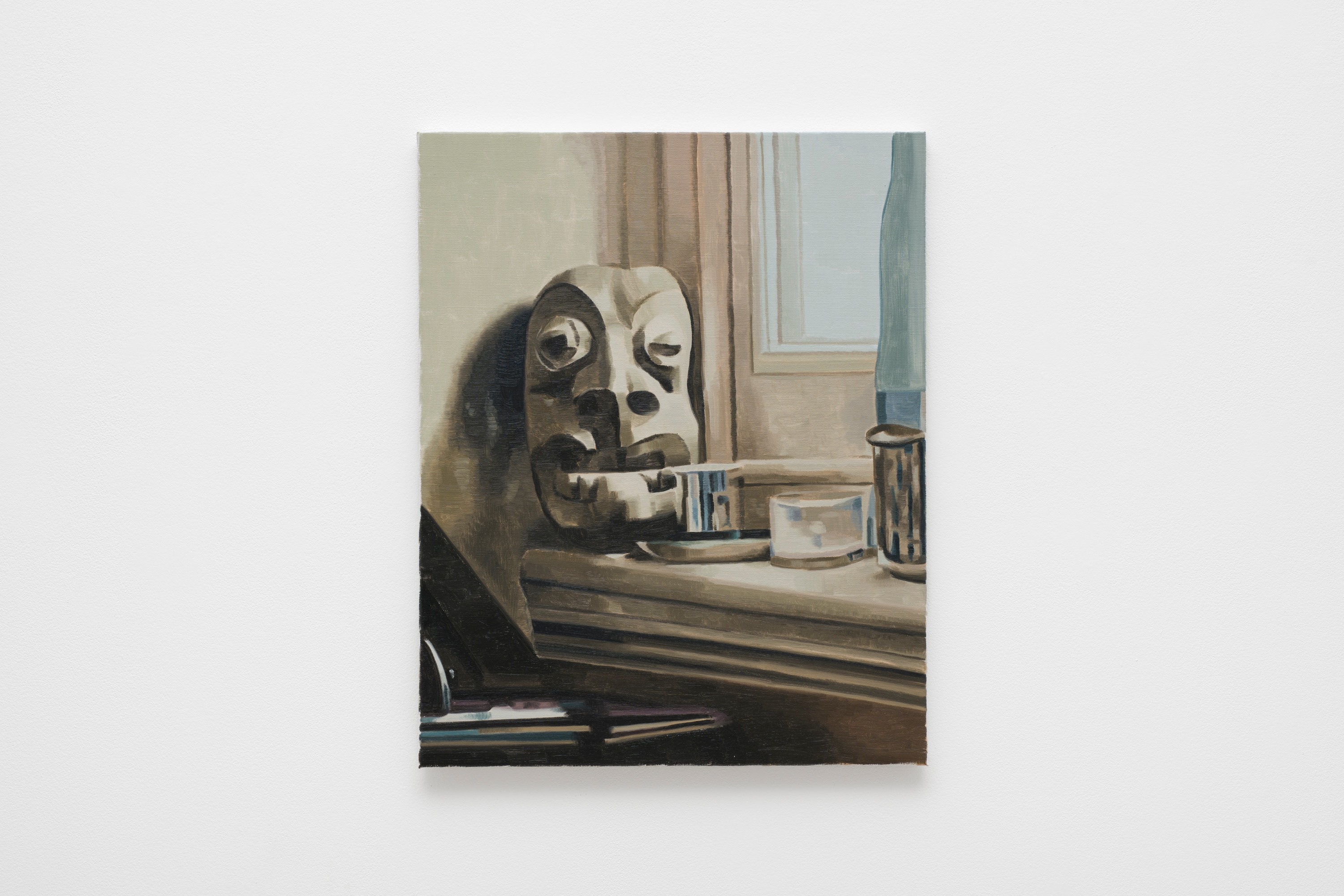 Mask on window ledge