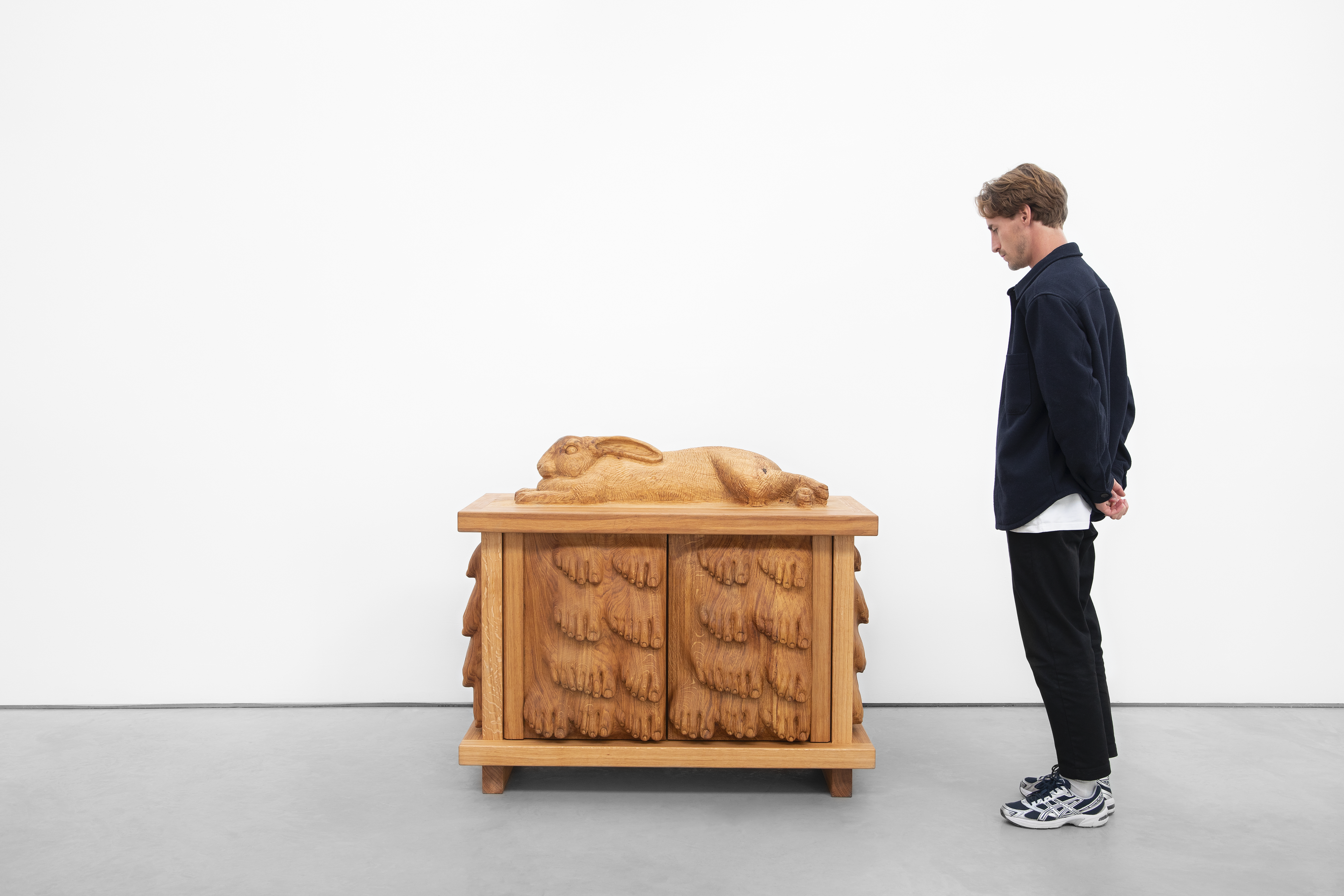 Oak cabinet with giant Flanders rabbit and feet