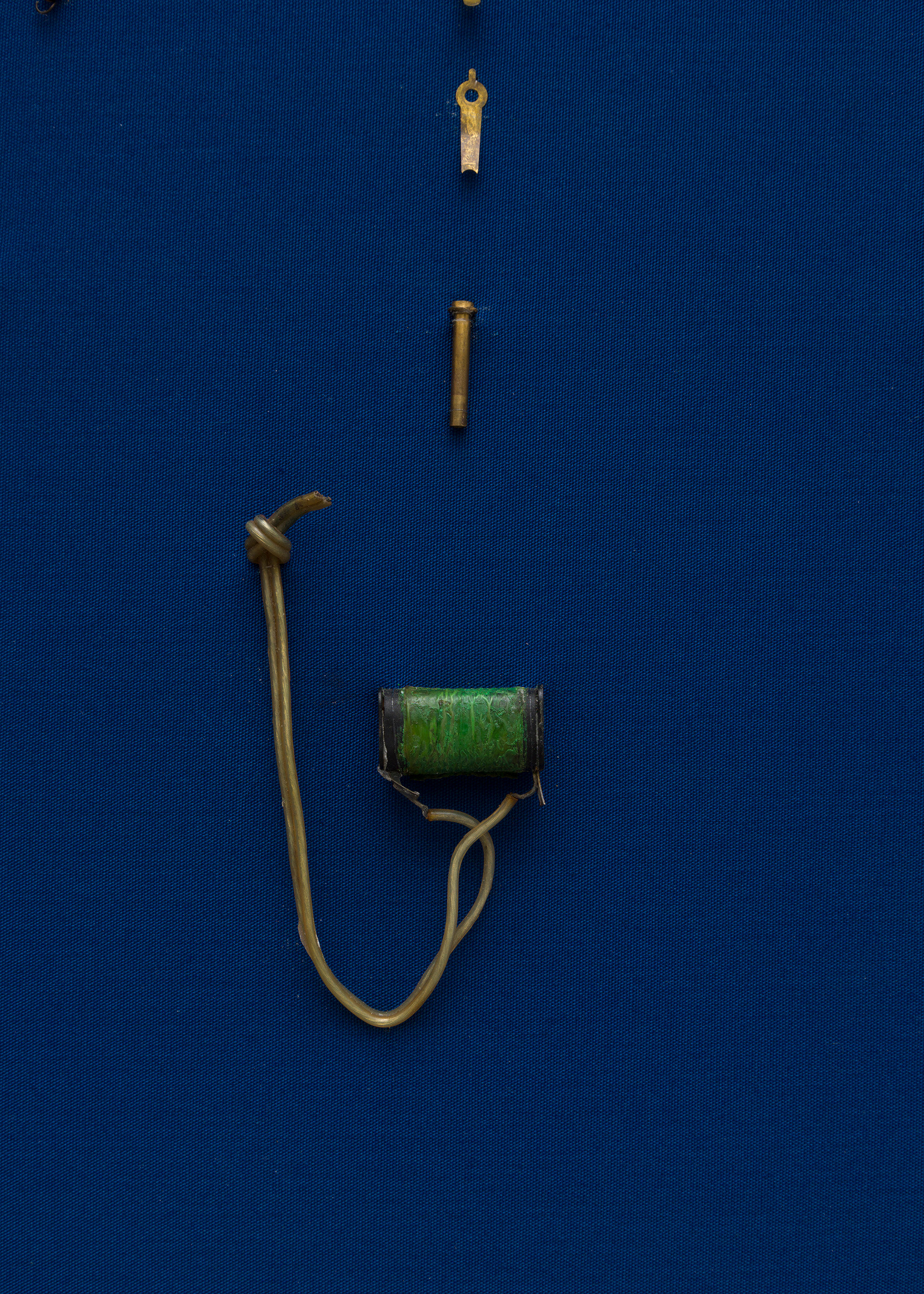 Hard wired server clock movement parts (face missing), museum case linings (cotton, vegetable dye), ...