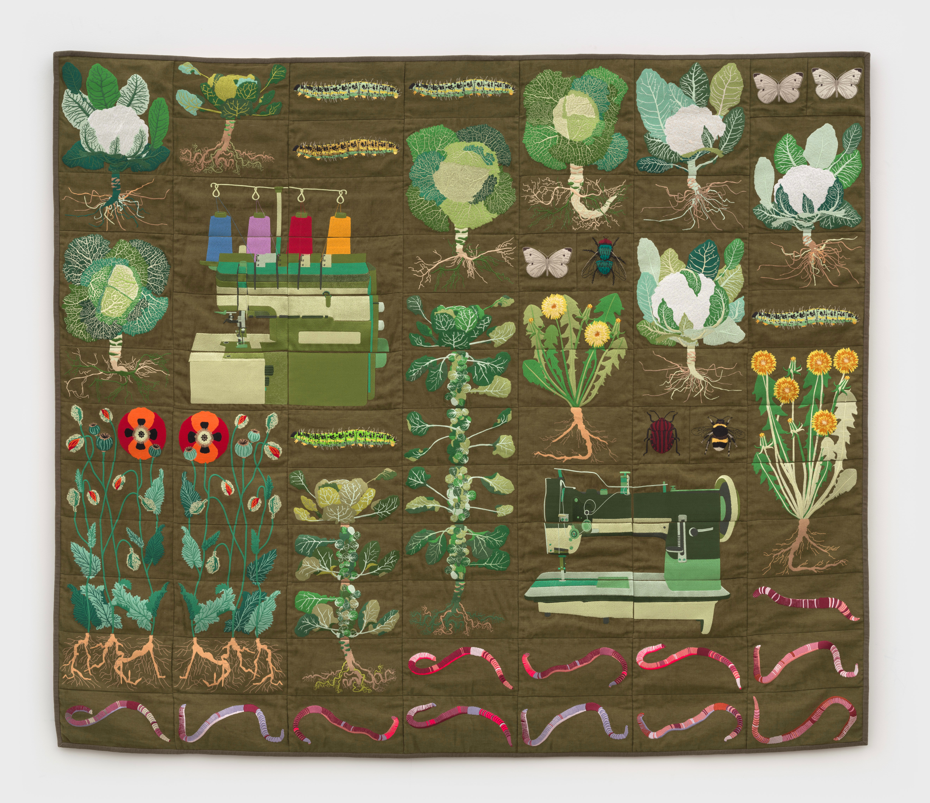Embroidered quilt with earthworms, Brussels sprout plants, Savoy cabbage plants, cauliflowers plants...