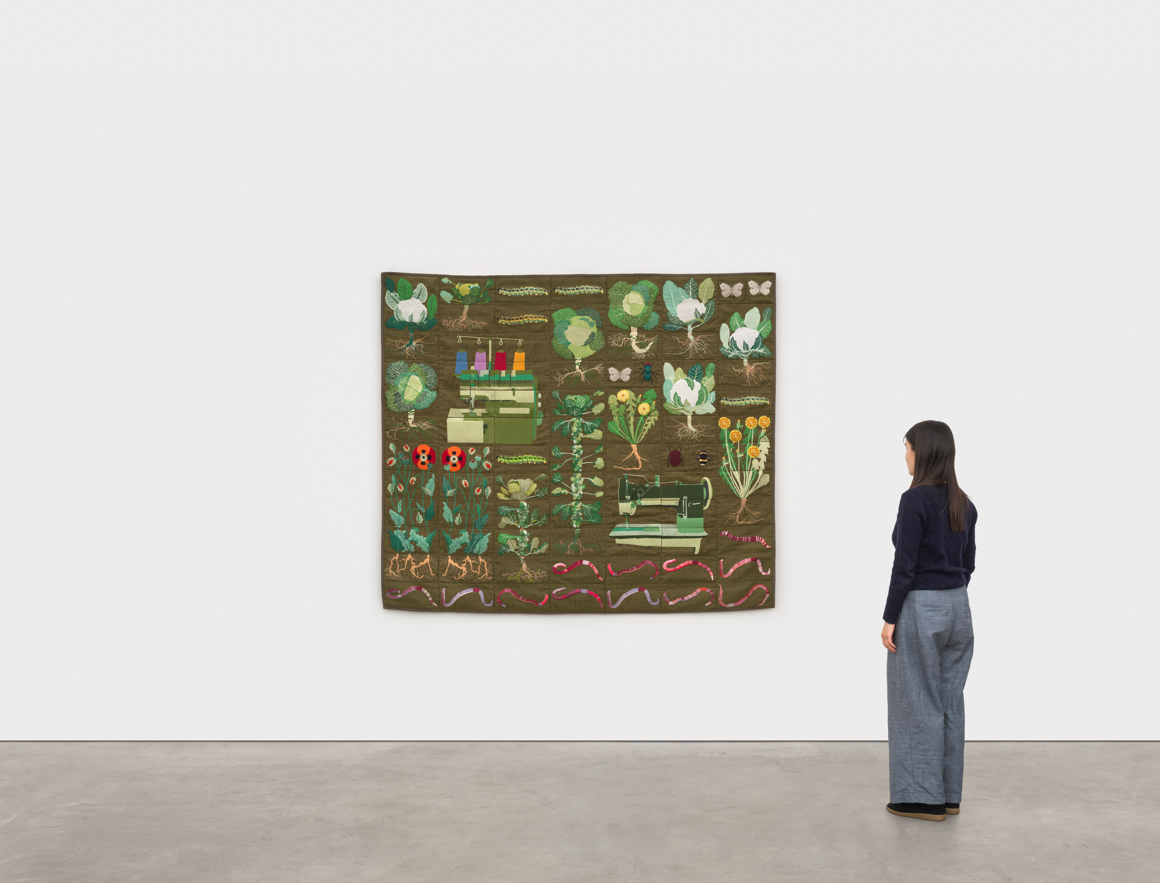 Embroidered quilt with earthworms, Brussels sprout plants, Savoy cabbage plants, cauliflowers plants...