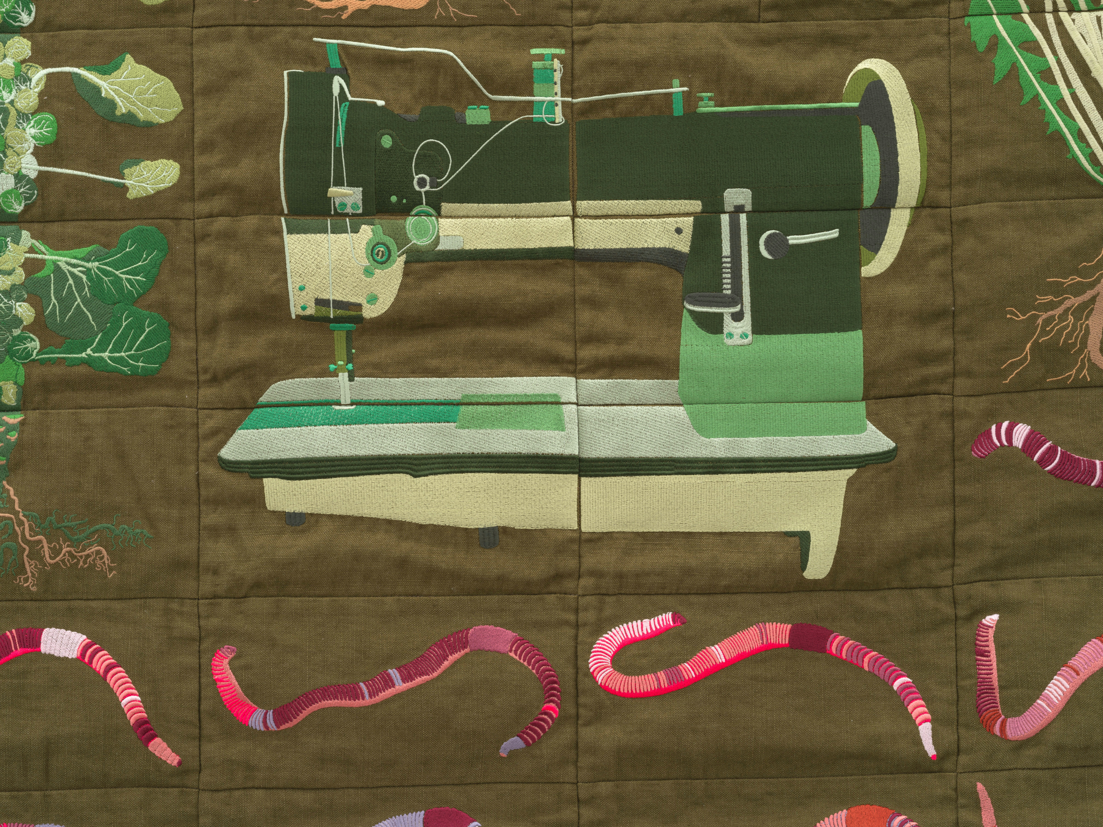 Embroidered quilt with earthworms, Brussels sprout plants, Savoy cabbage plants, cauliflowers plants...
