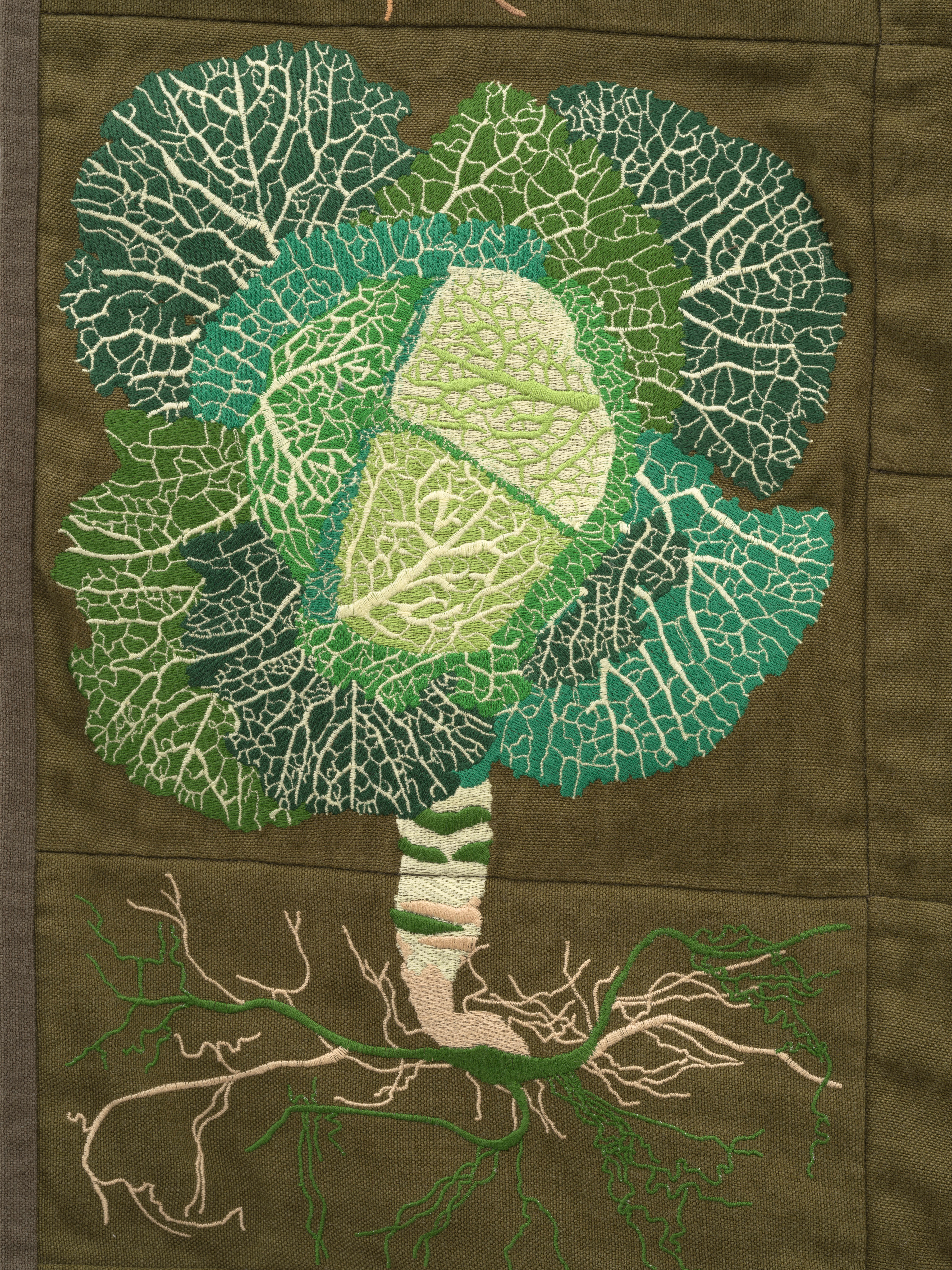 Embroidered quilt with earthworms, Brussels sprout plants, Savoy cabbage plants, cauliflowers plants...