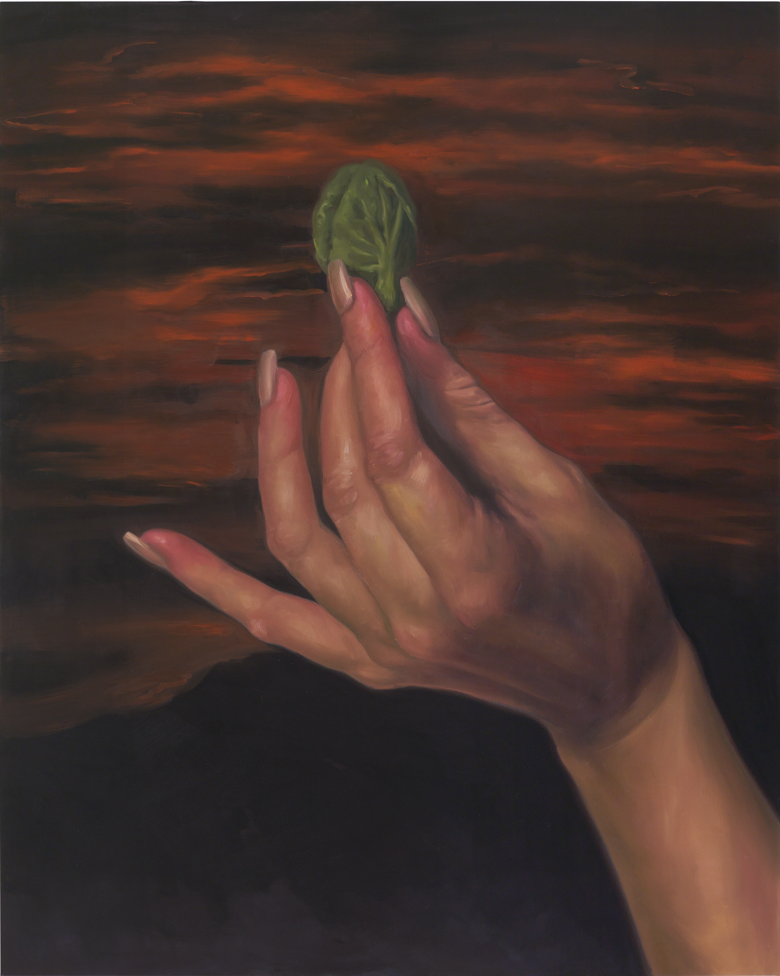 Hand Holding Brussels Sprout