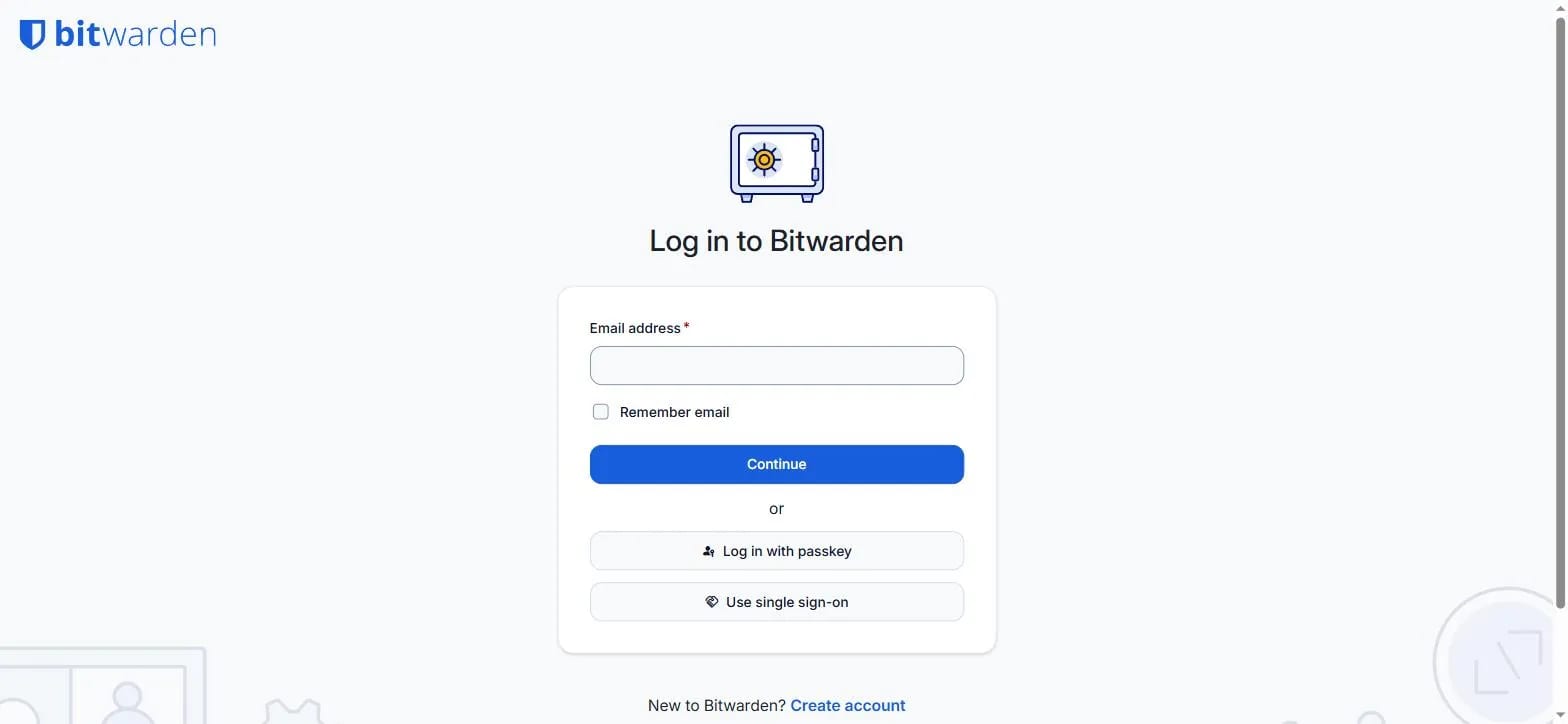 The real login screen of Bitwarden, a password manager, showing the email field and passkey / single sign-on options