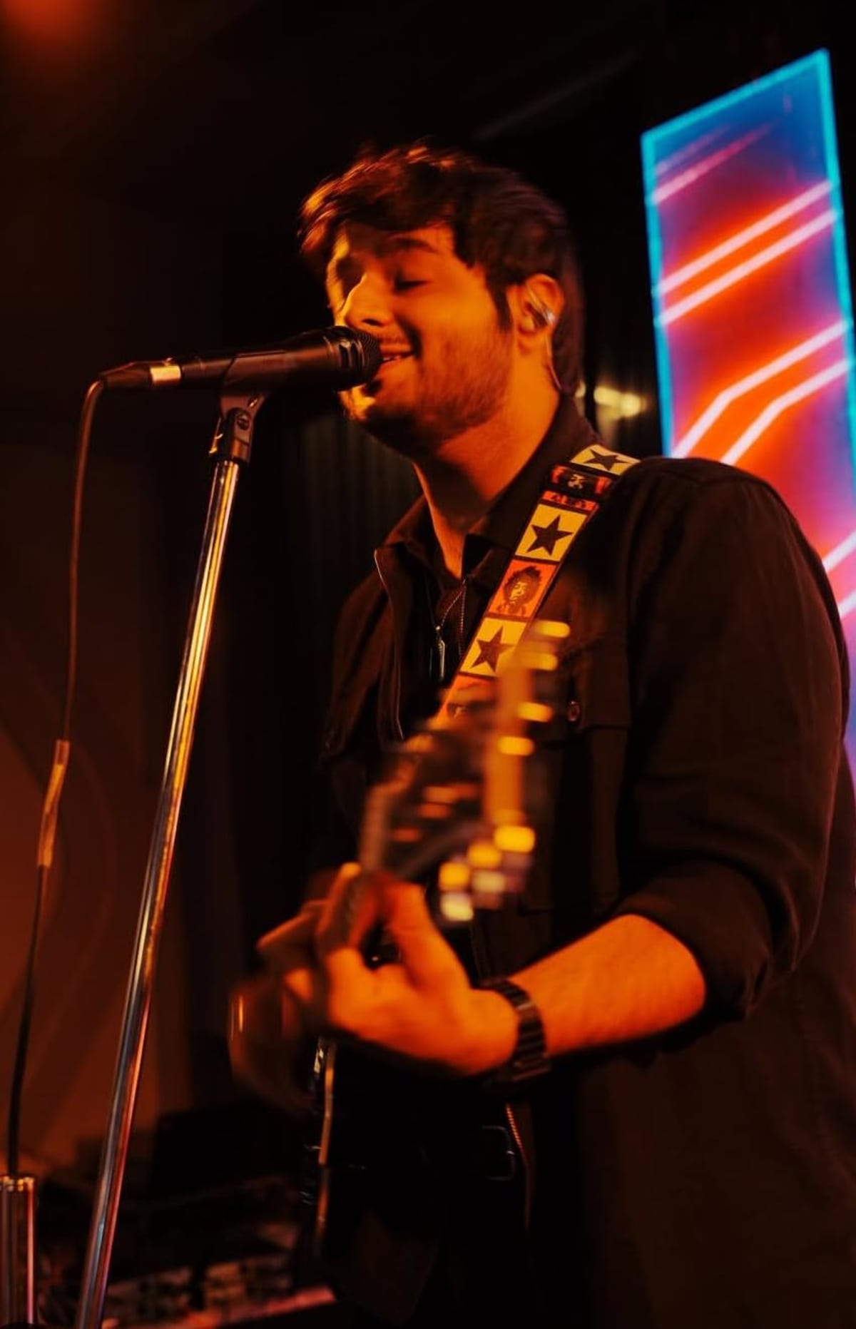 Live singer in Hyderabad performing on stage with a live band at a wedding event by Devashish Music