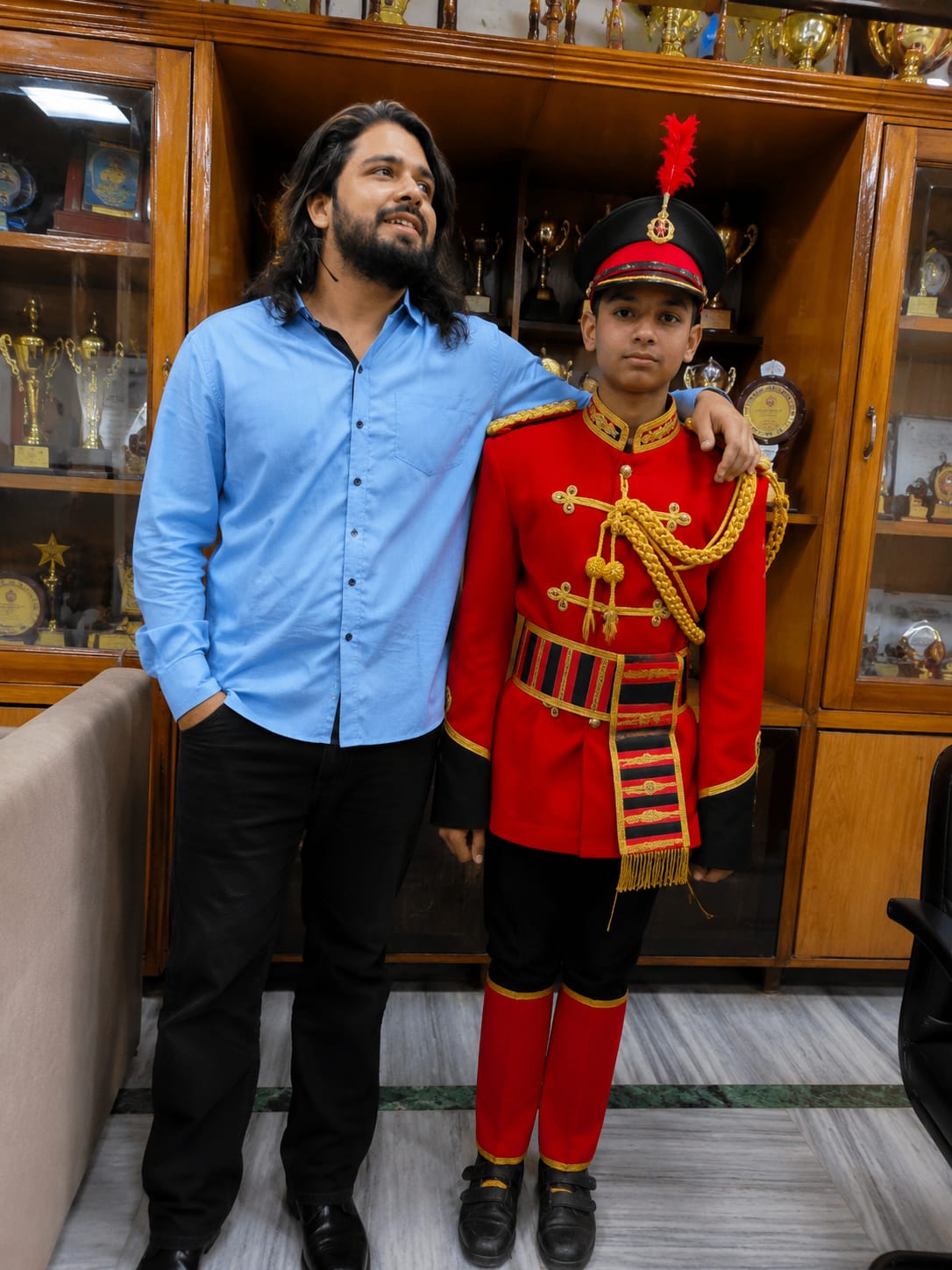 Devashish, Founder of Band Baazar, with a student in full ceremonial school band uniform