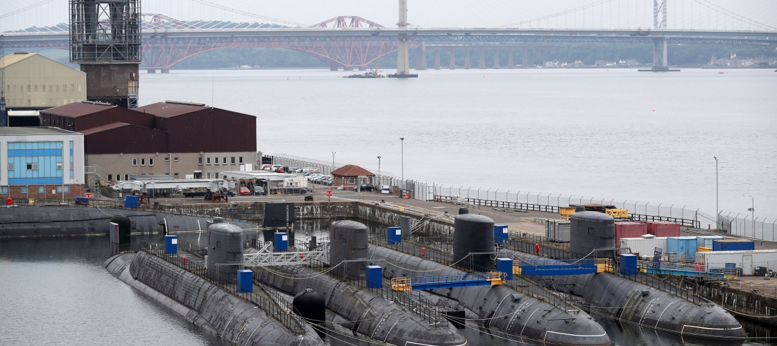 Decommissioned nuclear submarines alongside the Royal Navy's new aircraft carrier HMS Queen Elizabeth, at Rosyth Dockyard in Dunfermline. Decommissioned nuclear submarines alongside the Royal Navy's new aircraft carrier HMS Queen Elizabeth, at Rosyth Dockyard in Dunfermline.