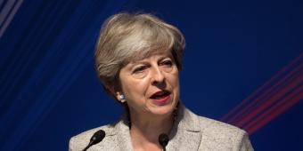 Theresa May backs off pledge to fight 2020 election