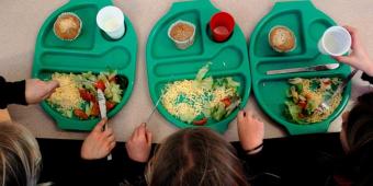 Top Tories back bid to use sugar tax on 'holiday hunger' clubs