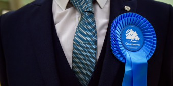 Tory peer defends visit to 'extremists' conference amid fury from MPs