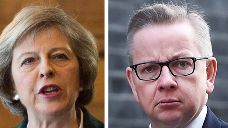 Theresa May vows to resist Brexiteer pressure to dilute workers' rights