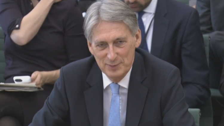 Philip Hammond: Brexit ‘cloud of uncertainty’ is damaging UK economy