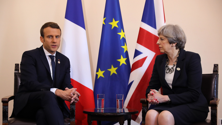 Theresa May and Emmanuel Macron threaten internet companies with fines over extremist posts