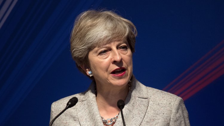 Theresa May backs off pledge to fight 2020 election