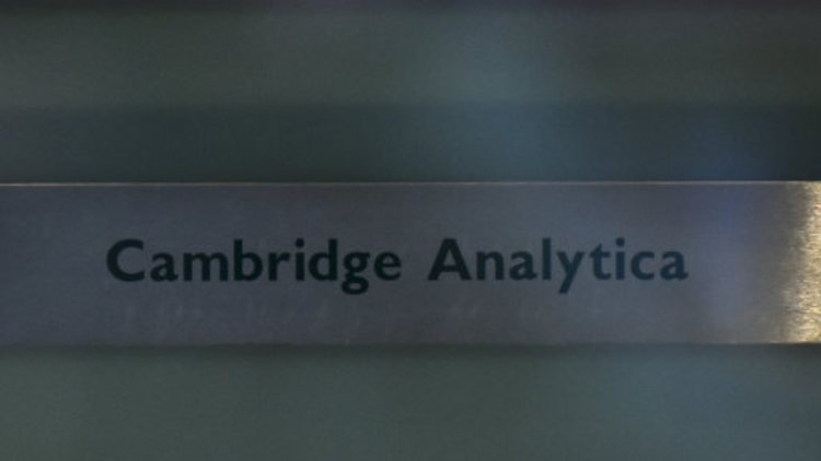 Government forced to defend links with scandal-hit political data firm