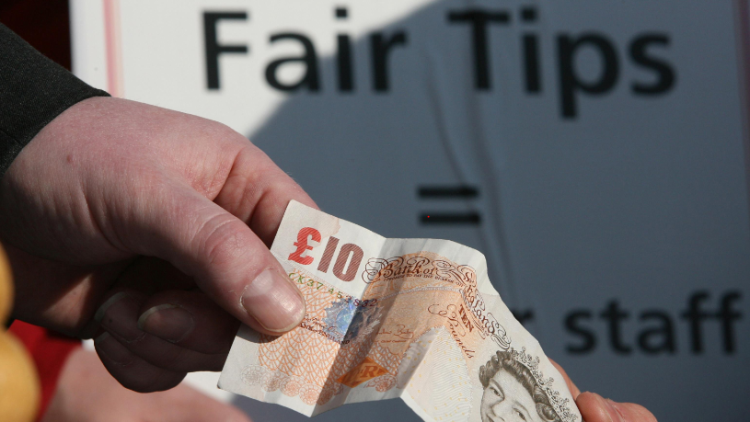 Bosses to be banned from taking workers' tips under government crackdown