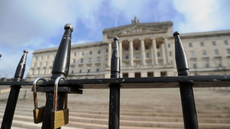 Theresa May visits Northern Ireland as parties push for power-sharing deal