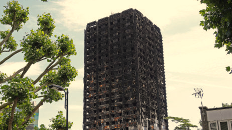 Theresa May condemns Grenfell Tower council over media blackout