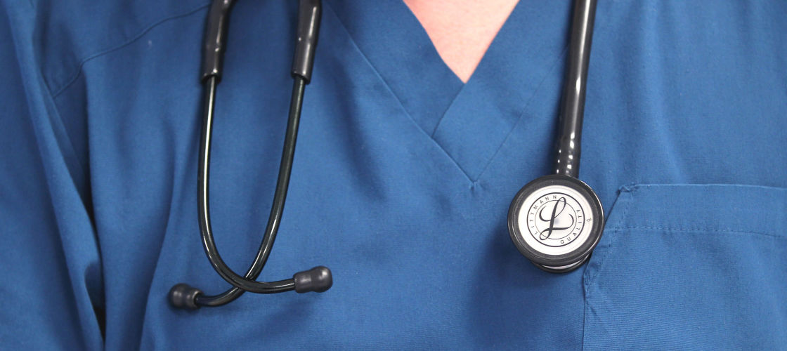 Doctors backed a motion saying the NHS was "consciously" starved of cash Doctors backed a motion saying the NHS was "consciously" starved of cash