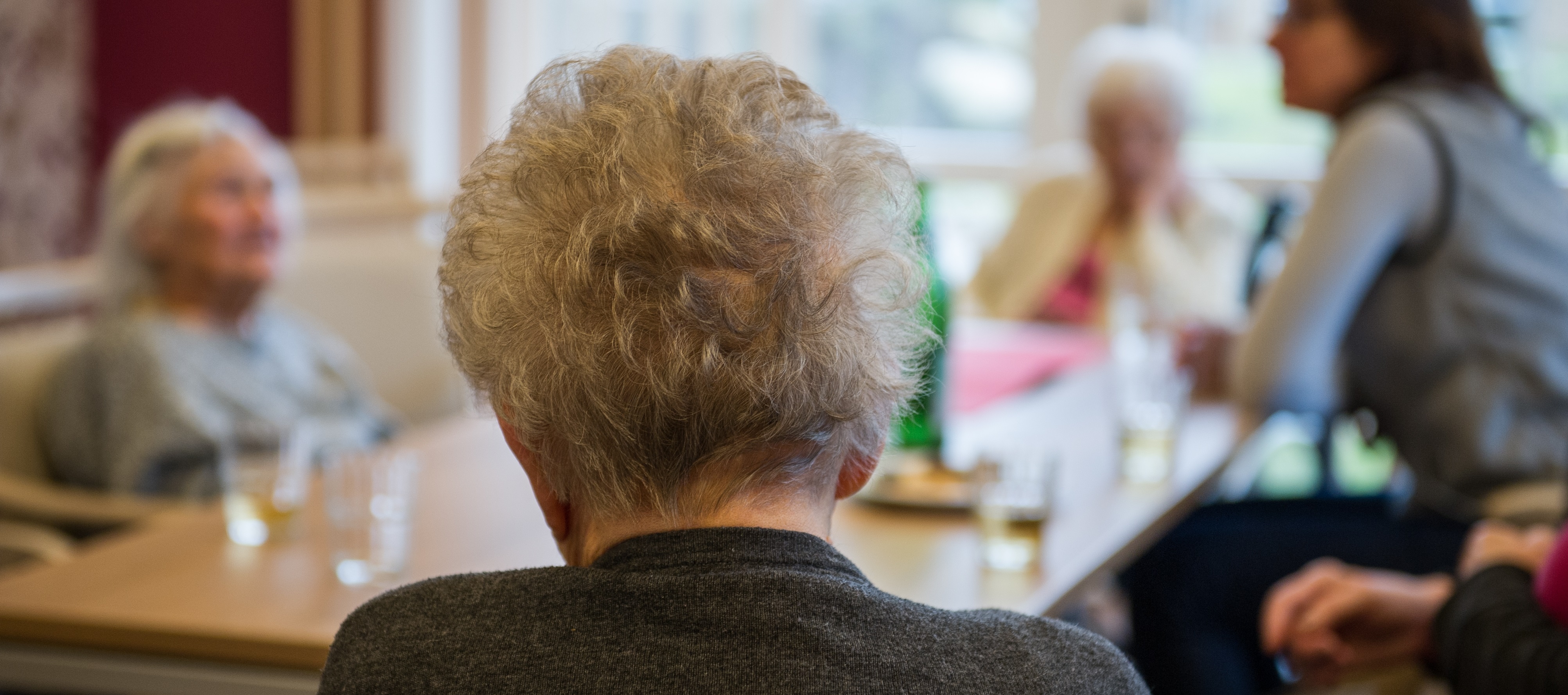 Dementia patients sit together Dementia patients sit together