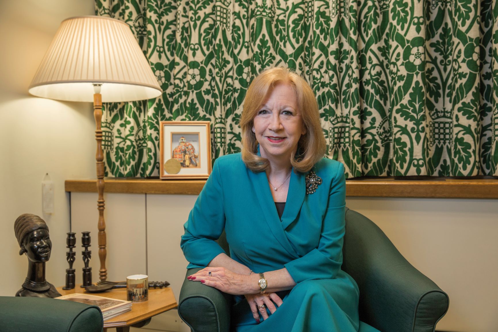 Dame Eleanor Laing MP in her House of Commons office Eleanor Laing MP sits in front of curtains patterned with green portcullises in her House of Commons office