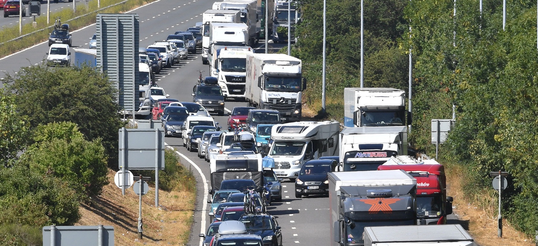 Traffic queueing on the M20 approaching the Eurotunnel terminal in Folkestone, Kent Traffic queueing on the M20 approaching the Eurotunnel terminal in Folkestone, Kent