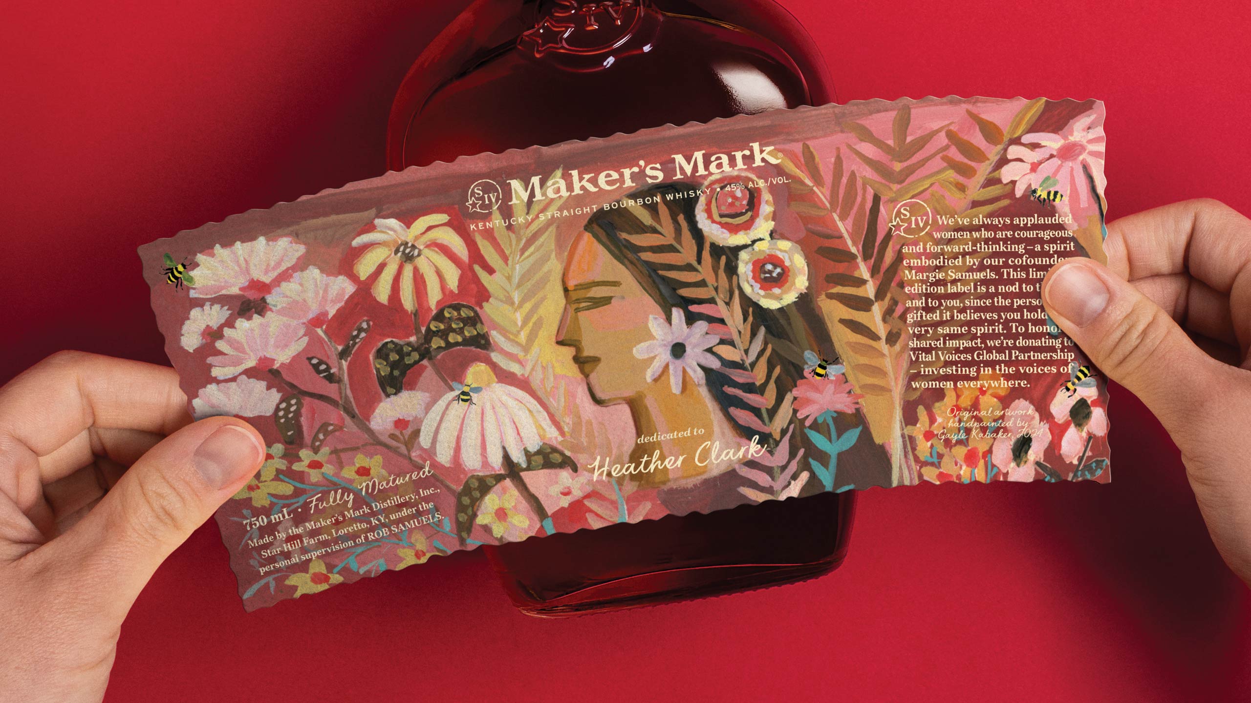 hands applying personalized label