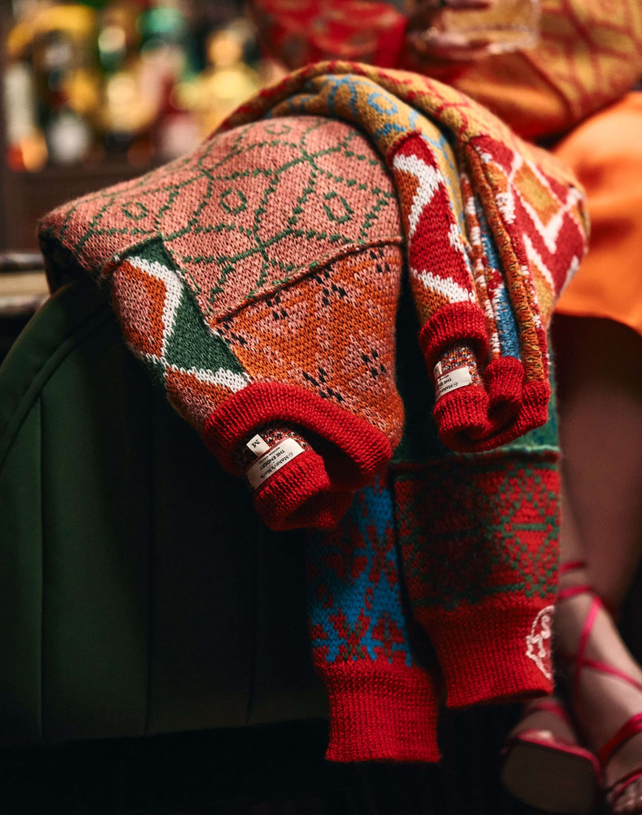 sweaters over chair