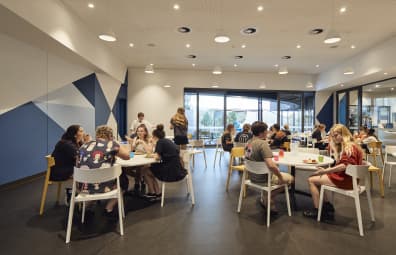 City Beach Residential College boarders enjoying dinner in the dining hall