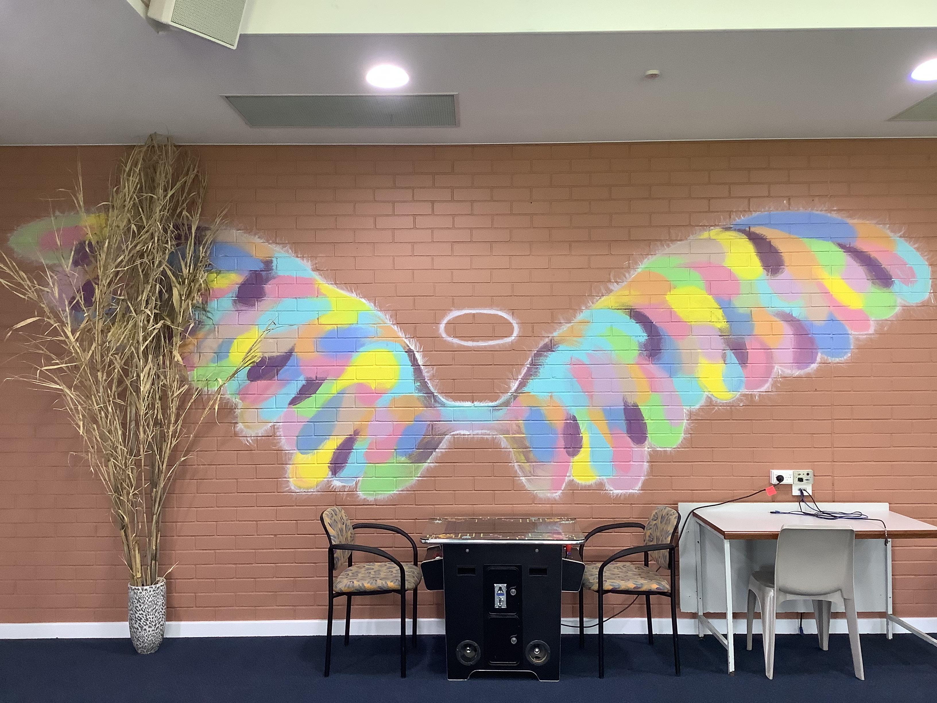 Mural of pastel coloured butterfly wings