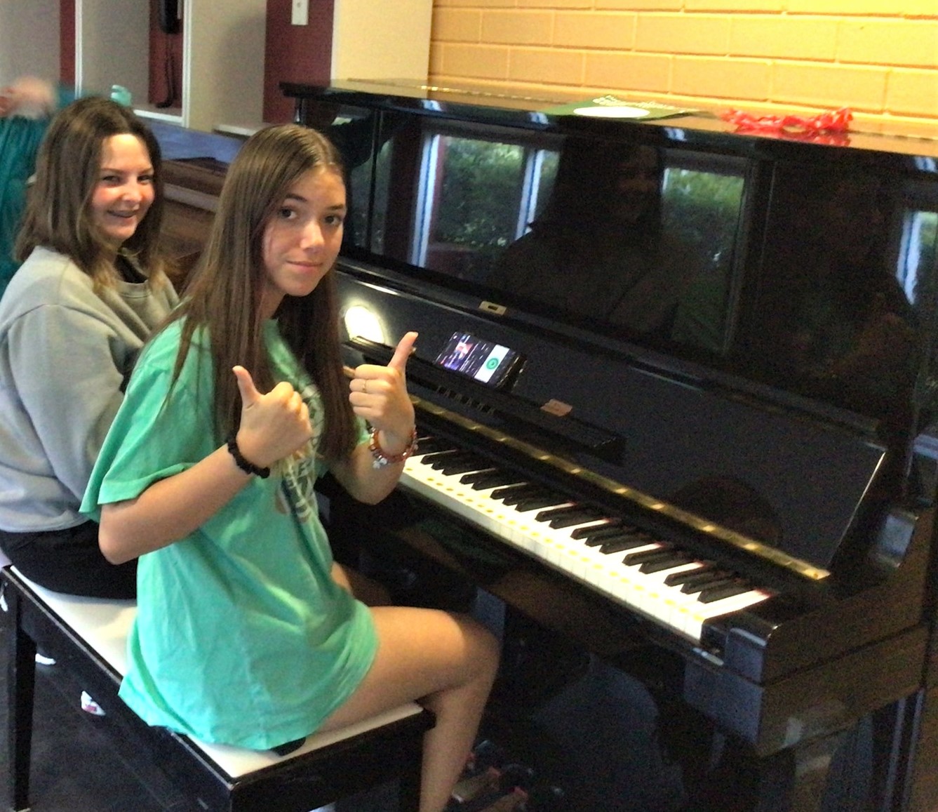 students with piano