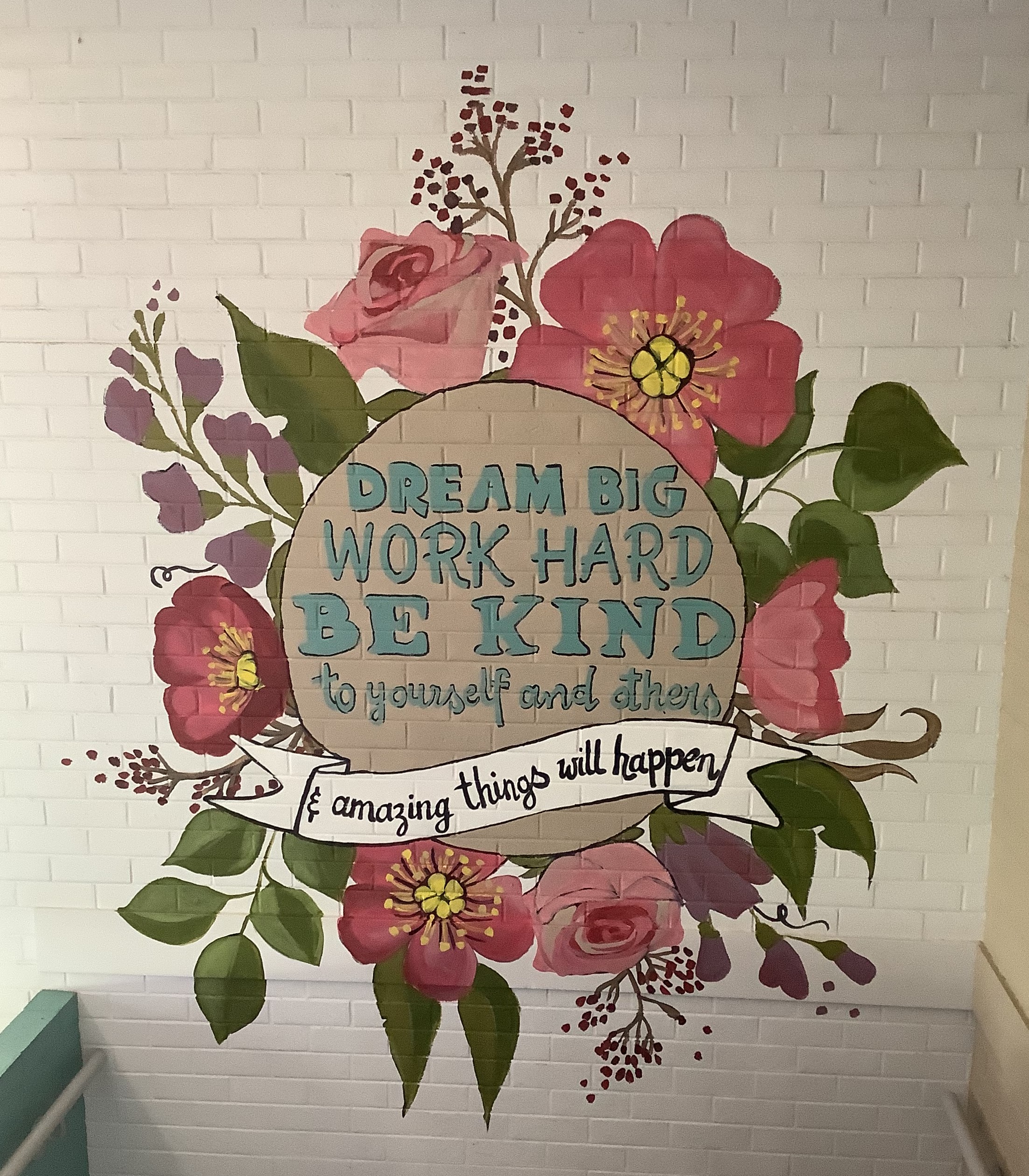 Mural saying "Dream big, work hard, be kind to yourself and others and amazing things will happen