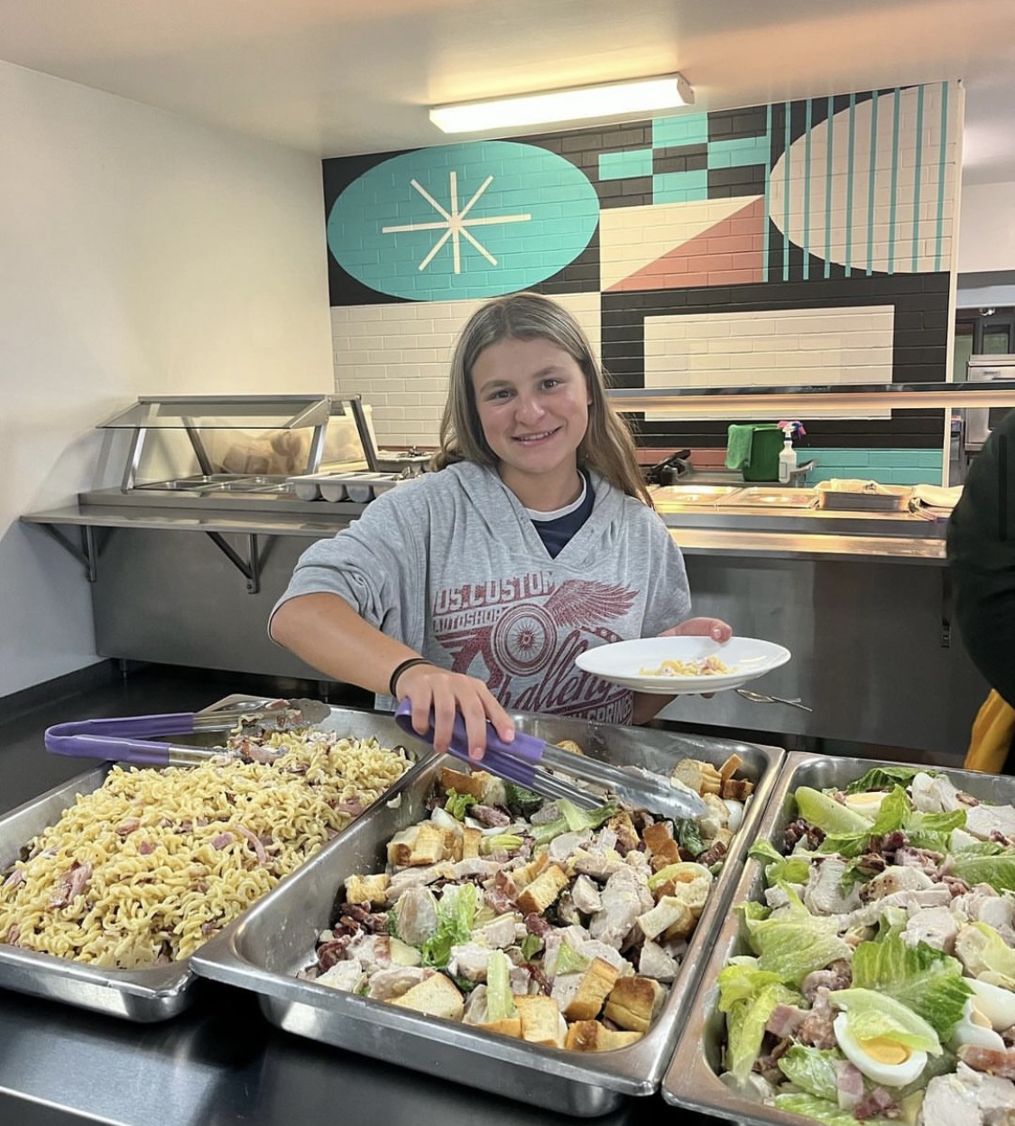 Pic of happy student serving food