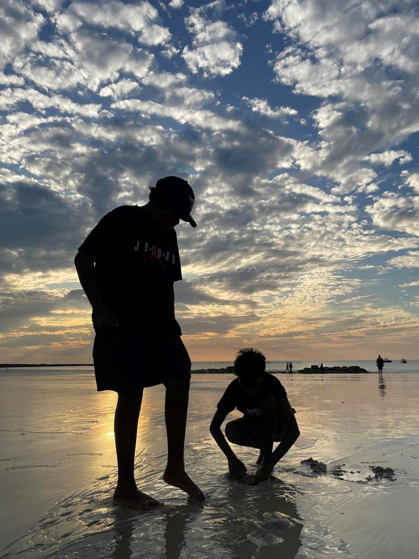 Students on a sunset beach in Broome