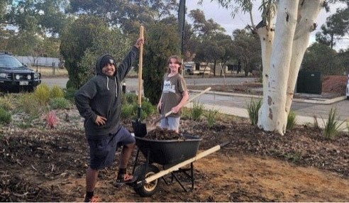 Moora residential college boarders building a yarning circle