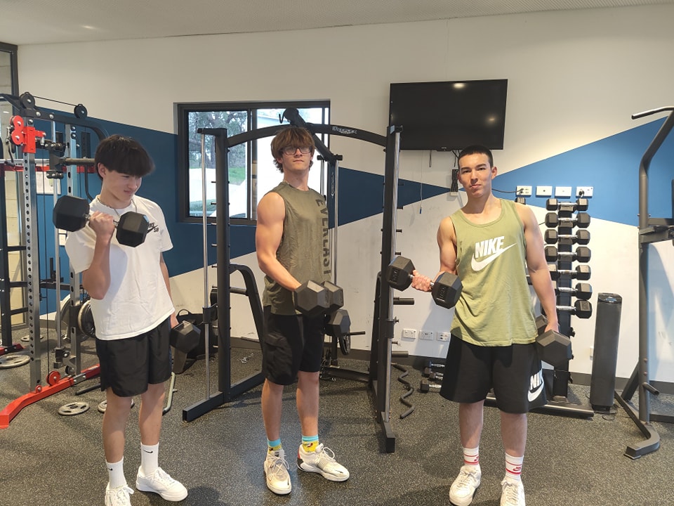 City Beach Residential College boarders using the college gym