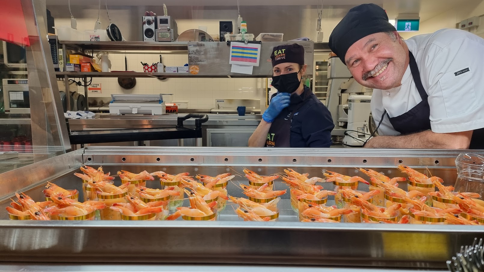 Esperance Residential College chef with a tray of prawn cocktails