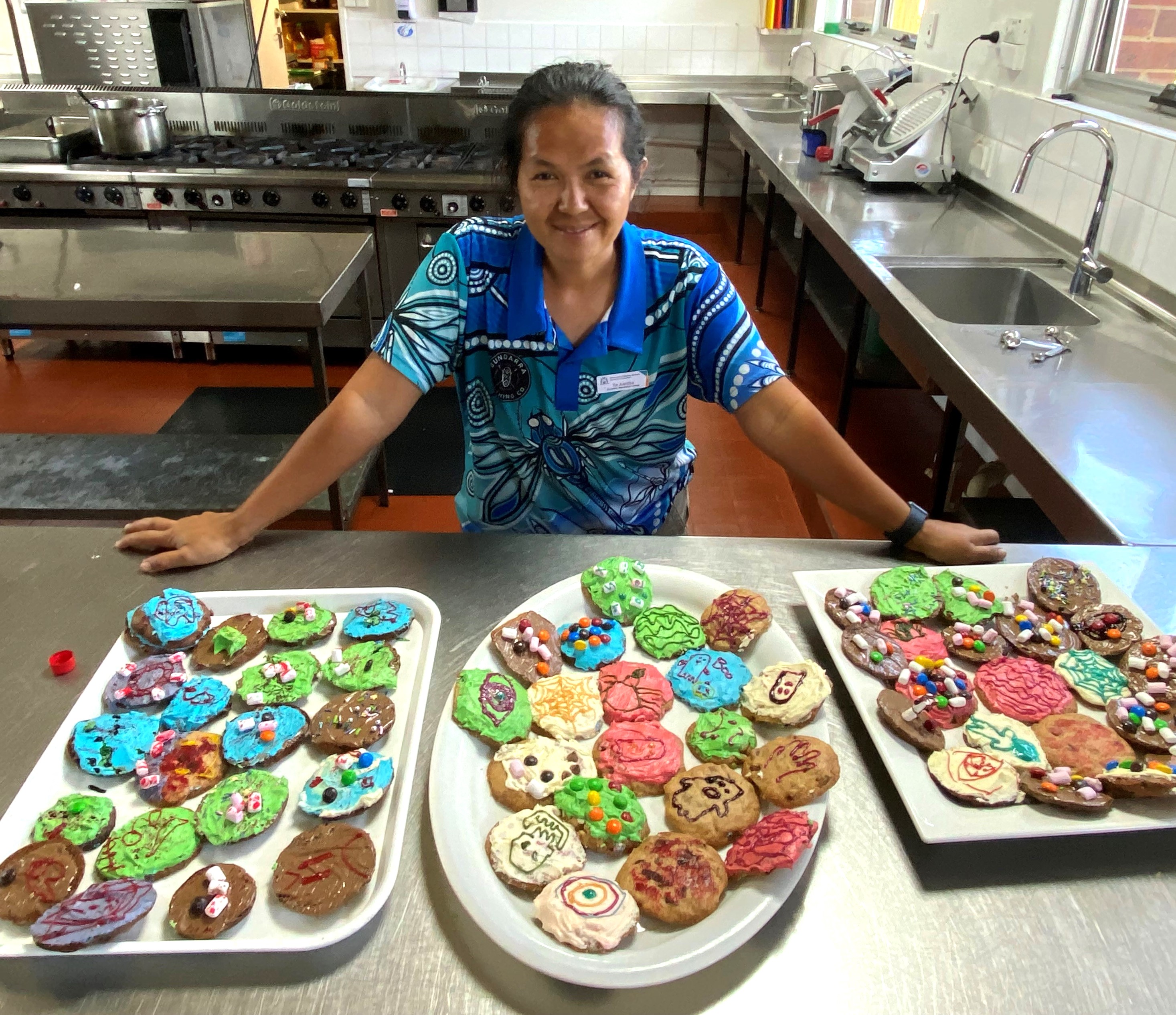 Geraldton Residential College cook with a batch of Halloween cookies