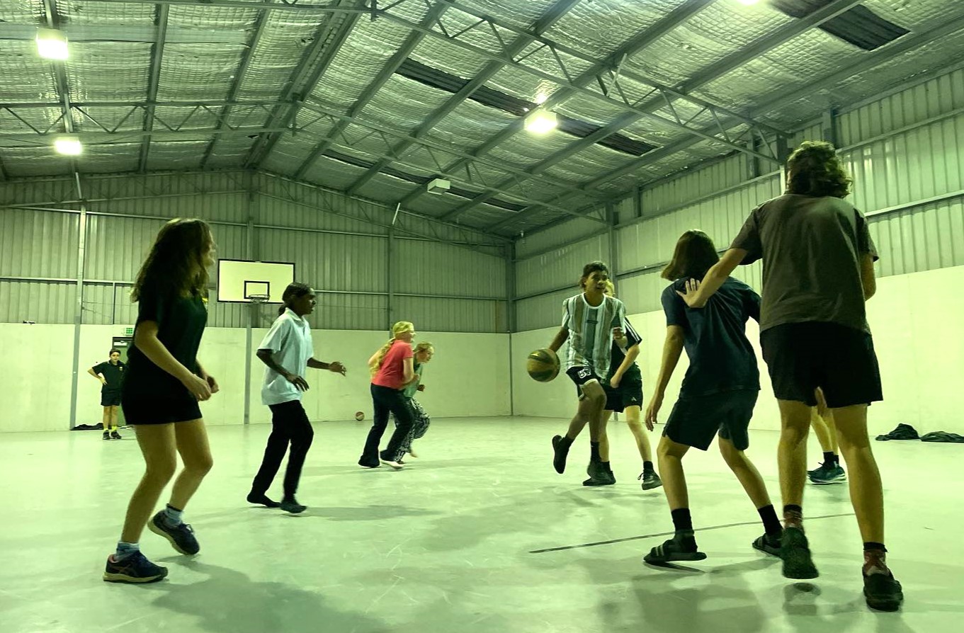 Albany Residential College boarders playing basketball on the undercover courts