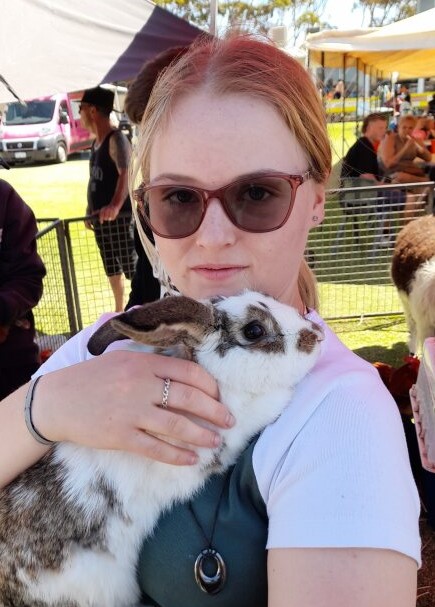 Northam Residential College boarder holding a fluffy bunny